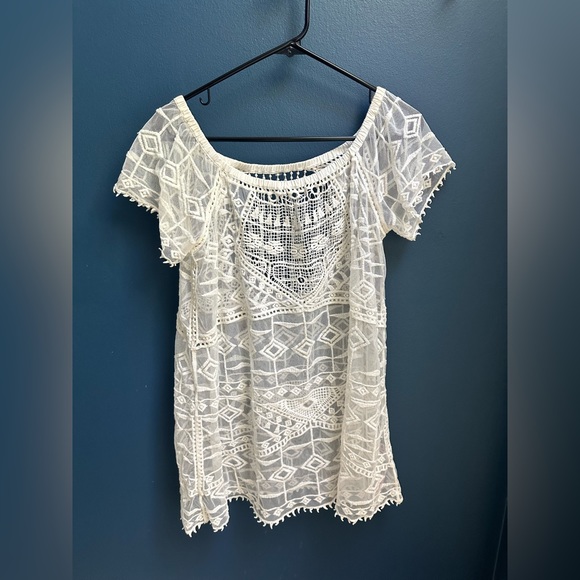 This is a lace off the shoulder swim coverup. - Picture 2 of 2